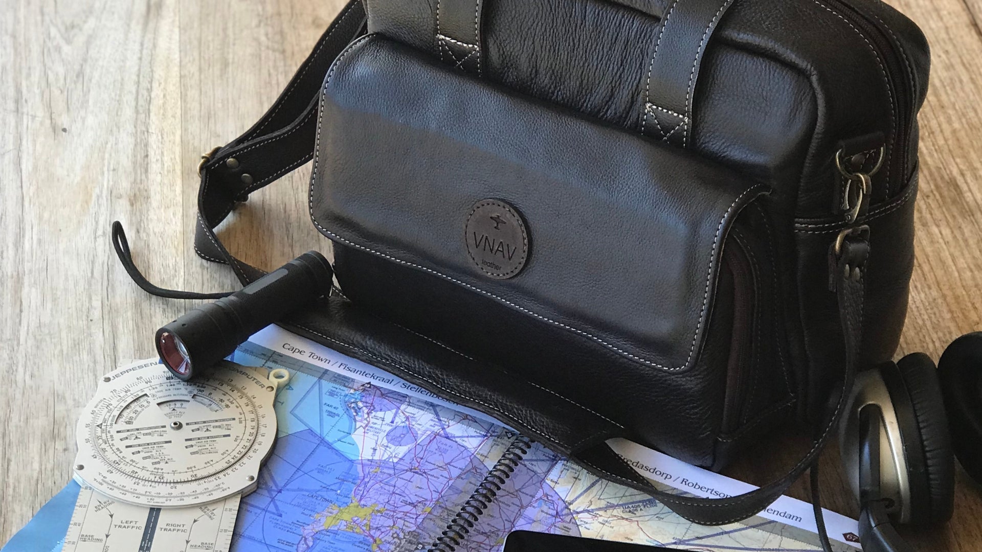 Navigate your world with a premium leather flight bag